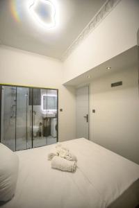 Postel nebo postele na pokoji v ubytování Etheras Luxury apartment