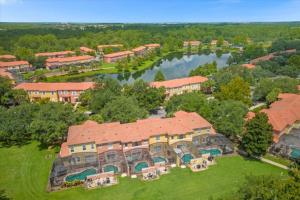 an aerial view of a large house with a river at 3 Bedrooms 25 Bathrooms Encantada 3122 Yl in Orlando