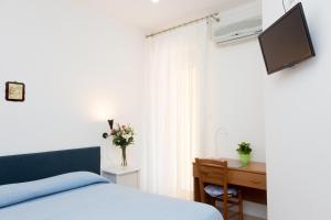 TV a/nebo společenská místnost v ubytování Terme Gorga Hotel
