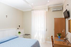 TV a/nebo společenská místnost v ubytování Terme Gorga Hotel