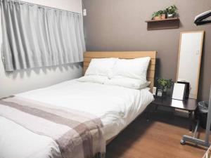 Кровать или кровати в номере Holy Inn