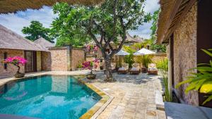 an image of a swimming pool in a villa at The Oberoi Beach Resort, Lombok in Tanjung