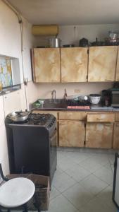 Kuchyň nebo kuchyňský kout v ubytování Habitación #1 prado centro