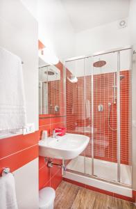 a bathroom with a sink and a shower at B&B La Torre in Castellammare del Golfo