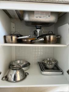 Η κουζίνα ή μικρή κουζίνα στο Aconchegante Pitangueiras - Ap. 1312