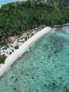 an aerial view of a beach and the ocean at Dryft Darocotan Island in El Nido +204 photos