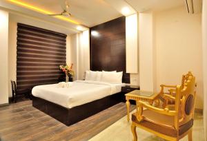 Postel nebo postele na pokoji v ubytování Hotel Kings Inn, Karol Bagh, New Delhi