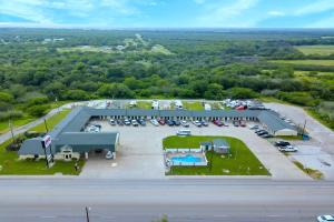 an aerial view of a parking lot at OYO Hotel Three Rivers TX US-281 in Three Rivers