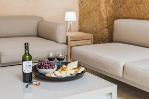 Nápoje v ubytovaní Bordoy Mostatxins - Hotel Boutique Adults Only
