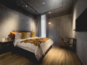 Postel nebo postele na pokoji v ubytování Hotel Mokozoyo
