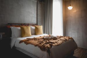 Postel nebo postele na pokoji v ubytování Hotel Mokozoyo