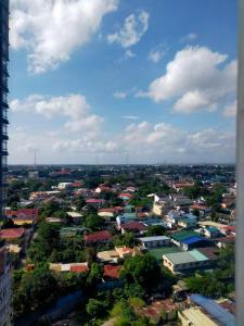 a view of a city with houses and buildings at Your Desire Staycation in Manila