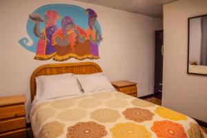 Ένα ή περισσότερα κρεβάτια σε δωμάτιο στο Bear Packer Hostel