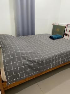 Postel nebo postele na pokoji v ubytování ORKED HOMESTAY HOSPITAL SULTANAH BAHIYAH Alor Setar