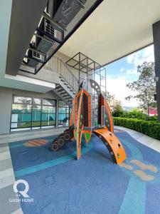 a playground in the middle of a building at Netflix,Sauna,Jacuzzi,Karoke,Cat Friendly in Kuala Lumpur