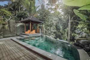 Bazén v ubytování Portobello Villa Ubud nebo v jeho okolí