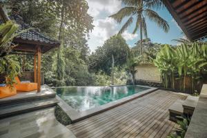 Bazén v ubytování Portobello Villa Ubud nebo v jeho okolí