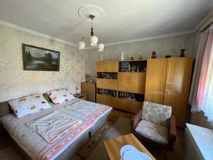 Posteľ alebo postele v izbe v ubytovaní Balla Mama, Hajdúszoboszló