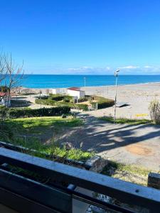 a view of the beach from a balcony at Ascensore per la spiaggia in Cirella