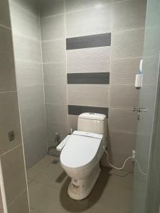Koupelna v ubytování Tomi House