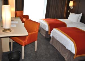 Krevet ili kreveti u jedinici u okviru objekta Hotel de la Source
