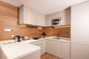 Eldhús eða eldhúskrókur á Rocase Boutique Hotel Wuxi