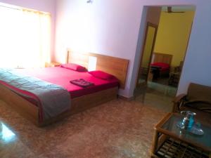 AYM Yoga Resort Arambol GOA客房内的一张或多张床位