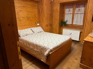 Voodi või voodid majutusasutuse Luxury Suite Terminillo toas