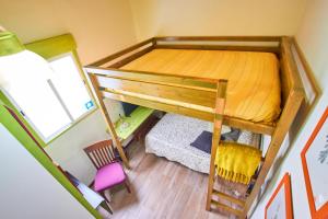 an overhead view of a bunk bed in a room at Studio Plaza Farray in Las Palmas de Gran Canaria