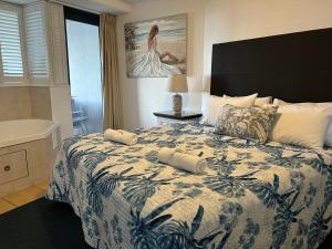 Postel nebo postele na pokoji v ubytování Prime Position – Dream Holiday Unit in Caloundra!! + 10 fotografií