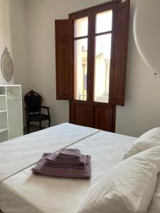 Postel nebo postele na pokoji v ubytování Dimora Taturì