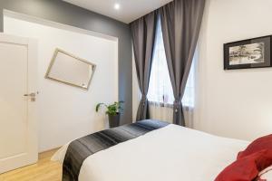 Posteľ alebo postele v izbe v ubytovaní Kazimierz Residence