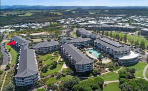 an aerial view of a building with a resort at Quiet Hotel Room in Mantra Salt Beach by uHoliday in Kingscliff