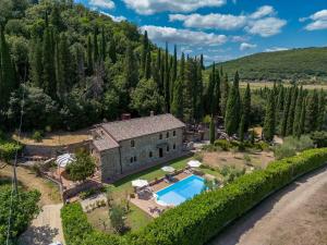 an estate in the hills with a swimming pool at PODERE MONTIONI 6&2, Emma Villas in Rapolano Terme