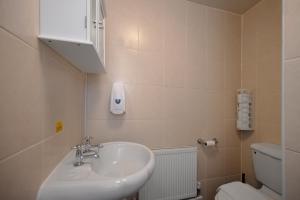 Koupelna v ubytování Flexistay Tulsi Aparthotel