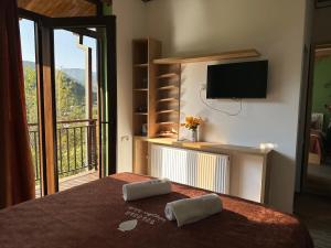 Rúm í herbergi á Pesvebi Design Hotel and Cellar