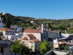 an aerial view of a city with buildings at Istamos apartment in Stamnoí