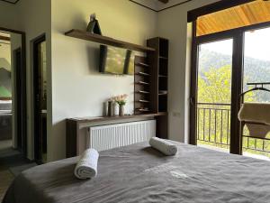 Rúm í herbergi á Pesvebi Design Hotel and Cellar