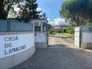 a sign that reads casa de lamarcas on a building at Casa de Lamaçais in Vilela