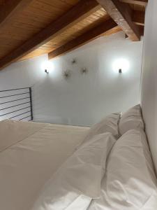 Postel nebo postele na pokoji v ubytování Dimora Taturì