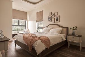 Postel nebo postele na pokoji v ubytování Davilla Đà Lạt Villa Collection
