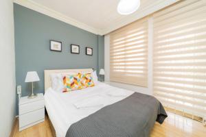 Ένα ή περισσότερα κρεβάτια σε δωμάτιο στο Bright