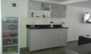A cozinha ou kitchenette de Hotel Onix T