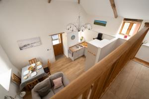 an overhead view of a kitchen and a living room at Orchard View in Stoke Rivers