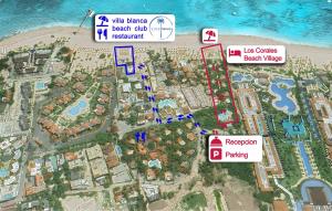 a map of a resort on a beach with condos at Los Corales Beach Village in Punta Cana
