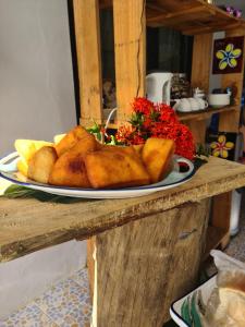 a plate of food on top of a table at The Ideal Bed & Breakfast in Nadi