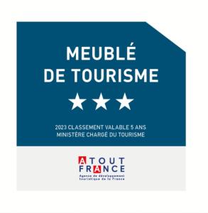 ein blaues Schild mit weißen Sternen und den Worten mobiler Tourismus in der Unterkunft Suite Perla - Balnéo et Sauna in Le Mée-sur-Seine
