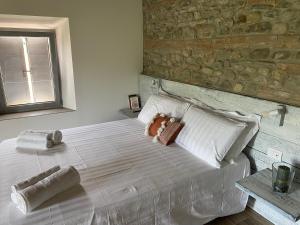Postel nebo postele na pokoji v ubytování Ca Baruffa B&B