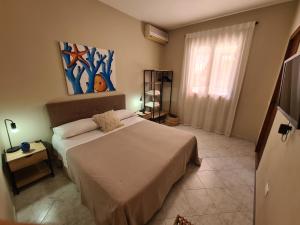 เตียงในห้องที่ Casa Calilla - 30m dal mare