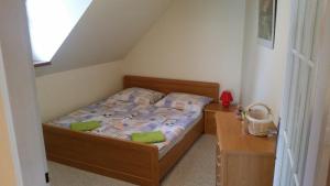Postel nebo postele na pokoji v ubytování Apartmán Ariana